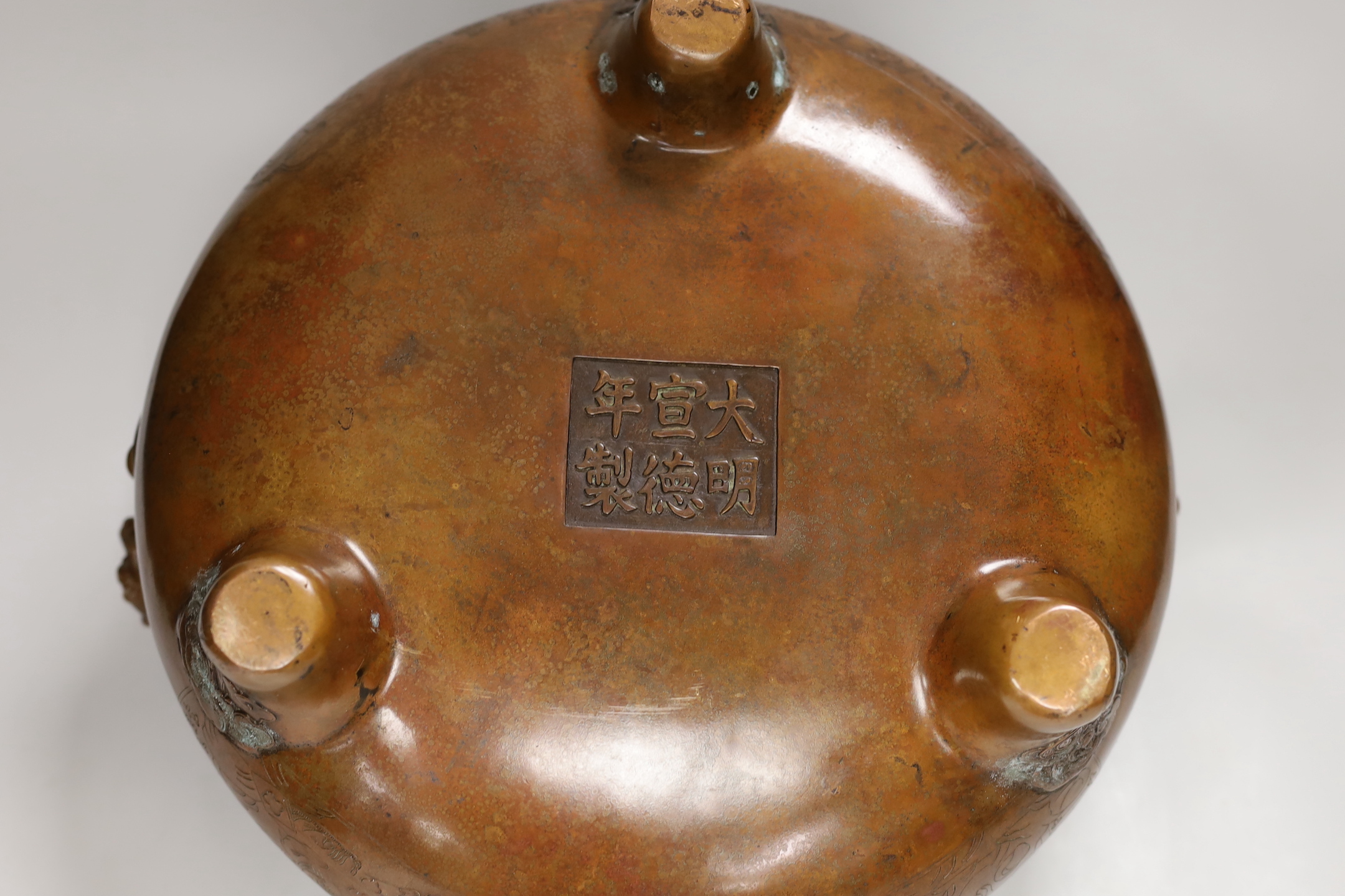 A massive Chinese brown patinated bronze ding censer, with dragon handles, 23.5cm including handles high